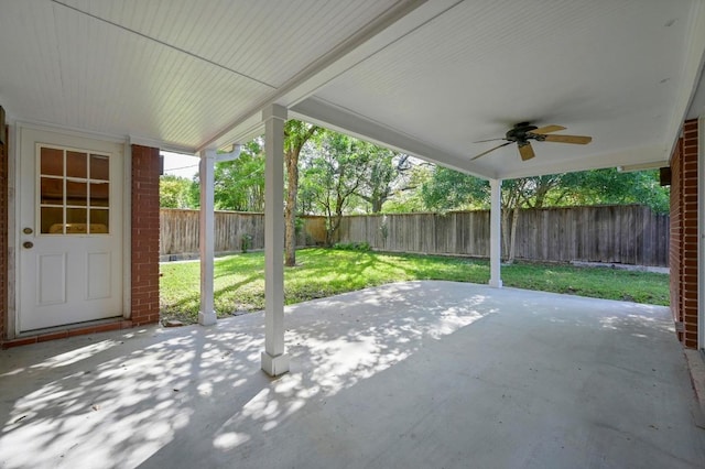 2710 Greenlawn Pkwy, Austin, TX 78757 - fenced backyard featuring ceiling fan and a patio