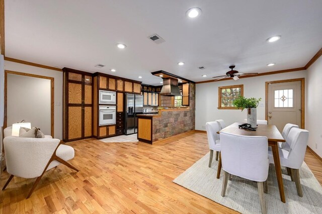 2710 Greenlawn Pkwy, Austin, TX 78757 - dining room featuring ornamental molding, light wood finished floors, recessed lighting, and ceiling fan