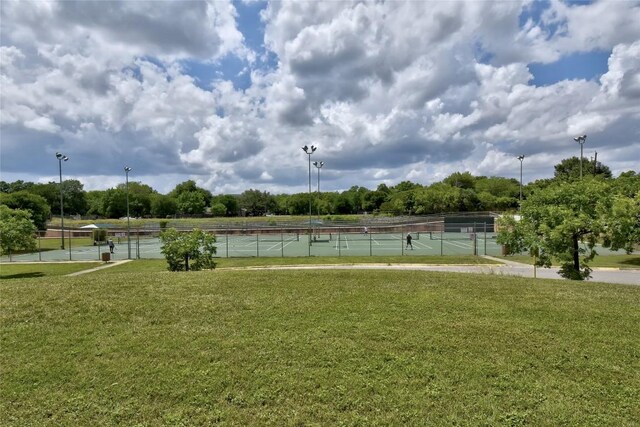 2710 Greenlawn Pkwy, Austin, TX 78757 - surrounding community with a tennis court and view of scattered trees