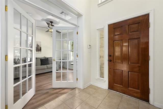 1903 Chula Vista Dr, Cedar Park, TX 78613 - foyer featuring a ceiling fan, french doors, and light tile patterned floors