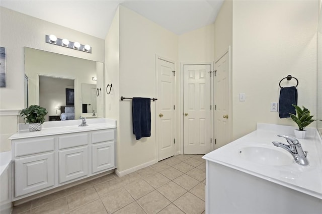 1903 Chula Vista Dr, Cedar Park, TX 78613 - bathroom featuring vanity, tile patterned flooring, and a bath