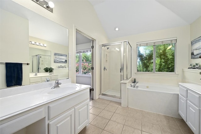 1903 Chula Vista Dr, Cedar Park, TX 78613 - bathroom featuring lofted ceiling, vanity, a garden tub, a shower stall, and tile patterned flooring