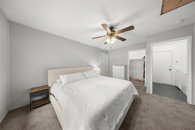 2016 Wanda St, Copperas Cove, TX 76522 - carpeted bedroom with a walk in closet, a ceiling fan, a textured ceiling, and a closet