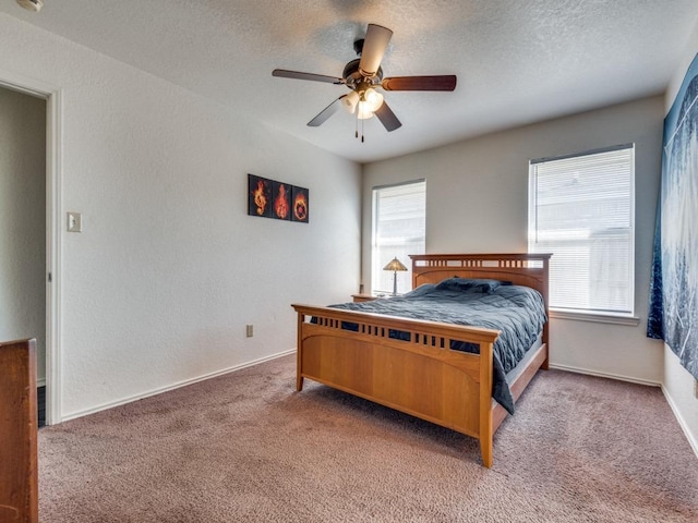 4503 Lori Dr, Killeen, TX 76549 - bedroom featuring carpet flooring, a textured ceiling, and a ceiling fan