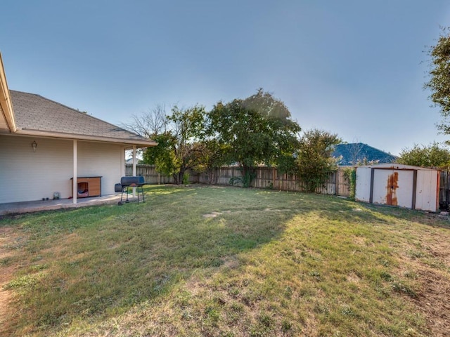 4503 Lori Dr, Killeen, TX 76549 - fenced backyard with a storage unit