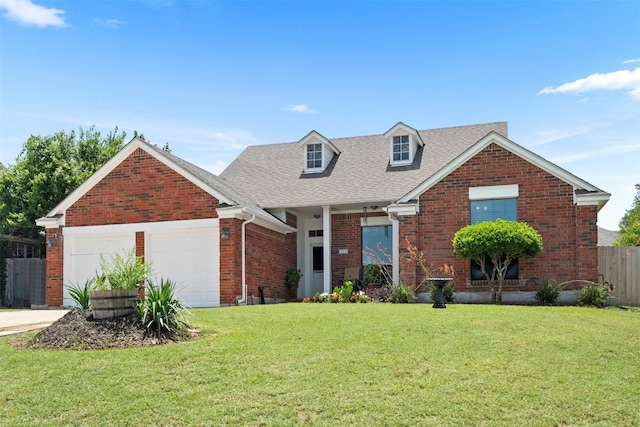 700 Canyon Bend Rd, Pflugerville, TX 78660 - view of front facade featuring brick siding, an attached garage, roof with shingles, and concrete driveway