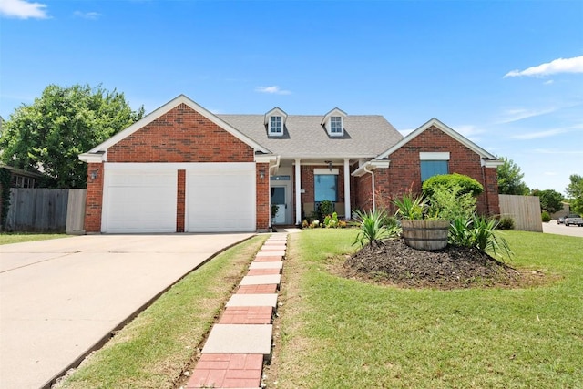 700 Canyon Bend Rd, Pflugerville, TX 78660 - view of front of home featuring brick siding, an attached garage, and concrete driveway