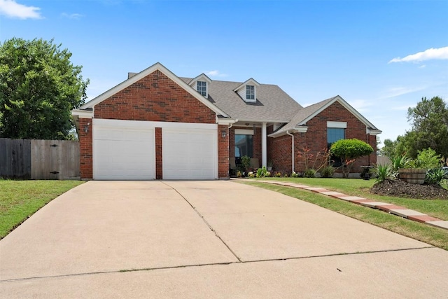 700 Canyon Bend Rd, Pflugerville, TX 78660 - view of front of house featuring brick siding, concrete driveway, and a garage