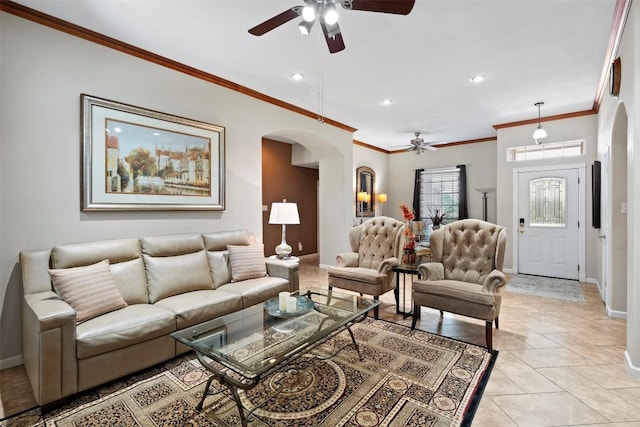 700 Canyon Bend Rd, Pflugerville, TX 78660 - living area with ceiling fan, arched walkways, ornamental molding, recessed lighting, and light tile patterned flooring