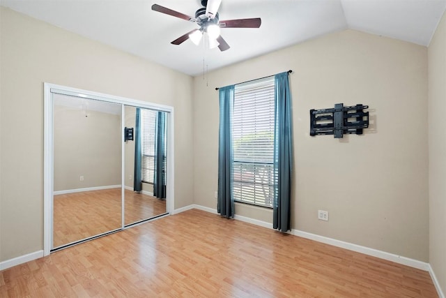 700 Canyon Bend Rd, Pflugerville, TX 78660 - unfurnished bedroom featuring light wood-type flooring, a closet, a ceiling fan, and vaulted ceiling