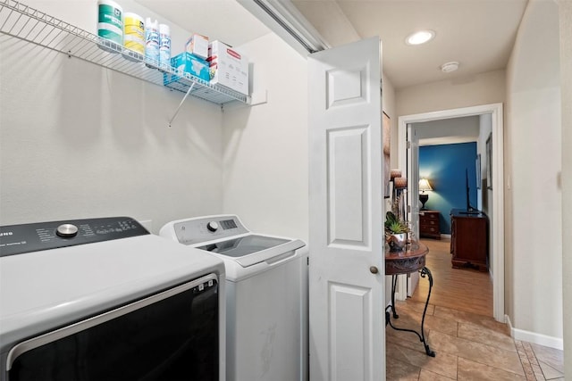 700 Canyon Bend Rd, Pflugerville, TX 78660 - laundry area featuring separate washer and dryer, light tile patterned flooring, and recessed lighting