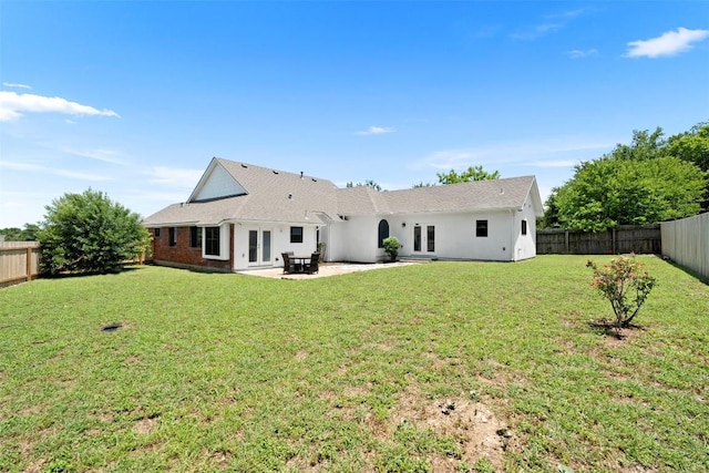 700 Canyon Bend Rd, Pflugerville, TX 78660 - rear view of property featuring french doors, a fenced backyard, and a patio area