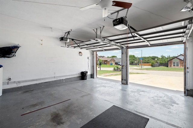 700 Canyon Bend Rd, Pflugerville, TX 78660 - garage featuring a garage door opener and a ceiling fan