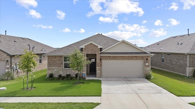 10708 Defender Trl, Austin, TX 78754 - view of front facade featuring an attached garage, driveway, a front yard, and brick siding