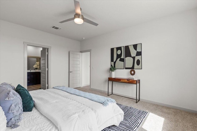 10708 Defender Trl, Austin, TX 78754 - carpeted bedroom with ceiling fan and ensuite bath