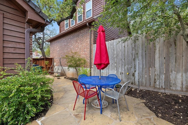3702 Terrina St Unit 12, Austin, TX 78759 - fenced backyard featuring a patio area and outdoor dining space
