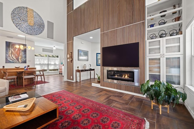 3702 Terrina St Unit 12, Austin, TX 78759 - living room with a towering ceiling and a glass covered fireplace