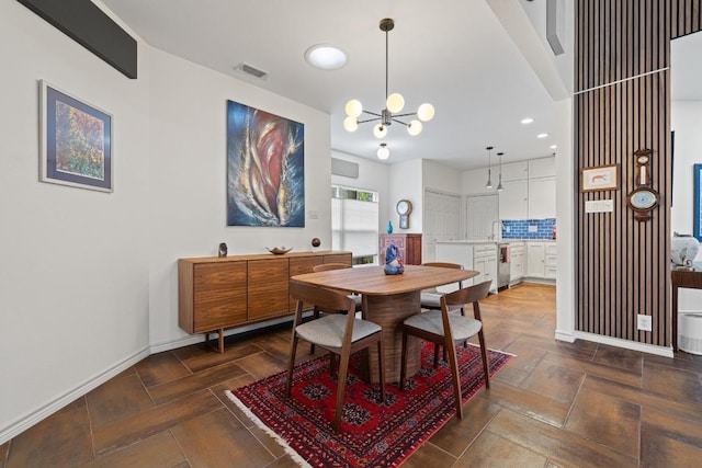 3702 Terrina St Unit 12, Austin, TX 78759 - dining room with a chandelier and recessed lighting