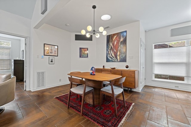 3702 Terrina St Unit 12, Austin, TX 78759 - dining space with baseboards and a chandelier