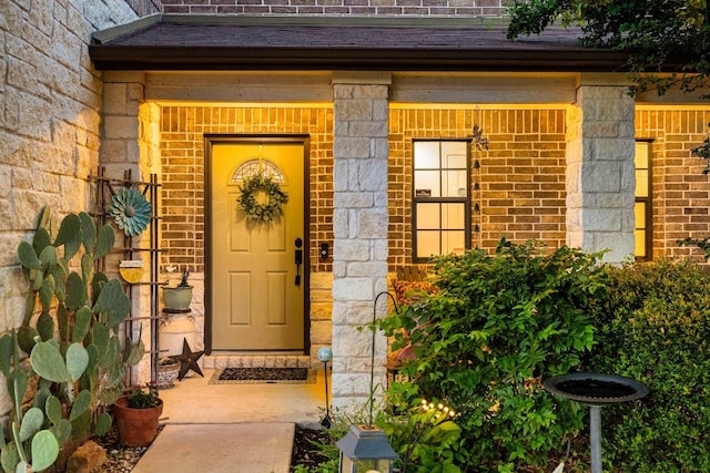 1149 Hyde Park Dr, Round Rock, TX 78665 - doorway to property with brick siding and a shingled roof
