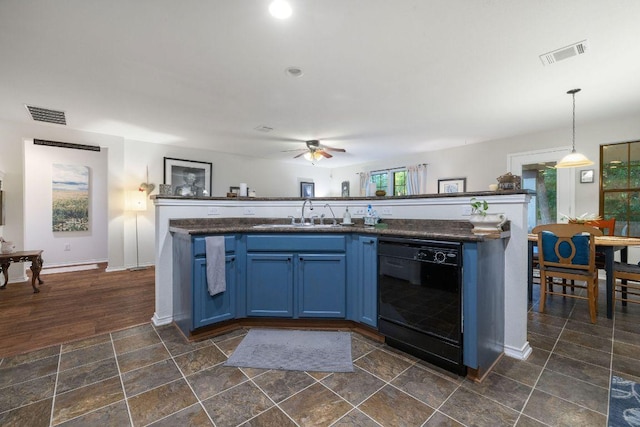 1149 Hyde Park Dr, Round Rock, TX 78665 - kitchen featuring dishwasher, blue cabinetry, ceiling fan, dark countertops, and pendant lighting