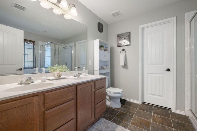 1149 Hyde Park Dr, Round Rock, TX 78665 - bathroom featuring a stall shower and double vanity
