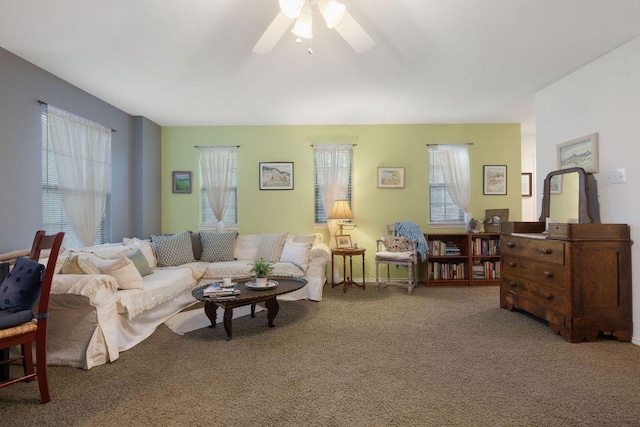 1149 Hyde Park Dr, Round Rock, TX 78665 - carpeted living room with healthy amount of natural light and ceiling fan