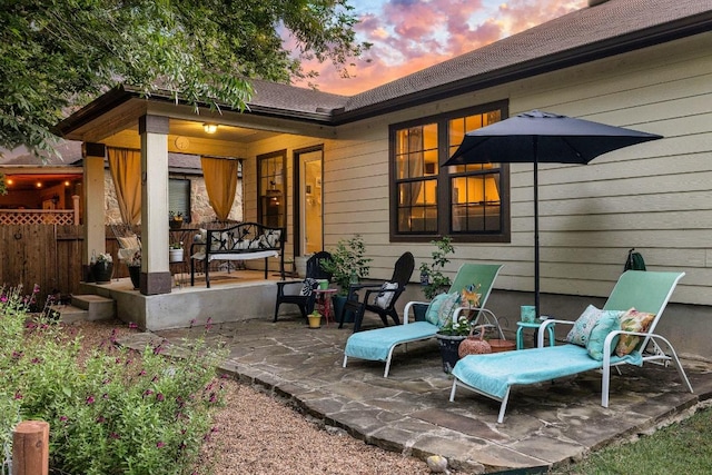 1149 Hyde Park Dr, Round Rock, TX 78665 - patio terrace at dusk featuring a porch