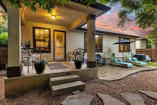 1149 Hyde Park Dr, Round Rock, TX 78665 - patio terrace at dusk featuring a patio area