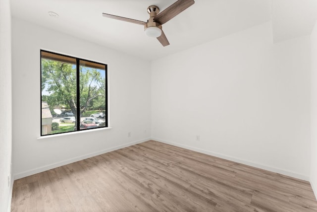 903 Silver Quail Ln, Austin, TX 78758 - spare room with light wood-style flooring and a ceiling fan