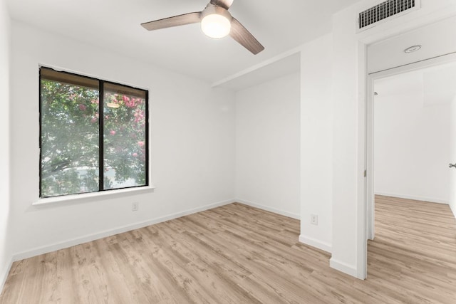 903 Silver Quail Ln, Austin, TX 78758 - unfurnished bedroom with wood finished floors and ceiling fan