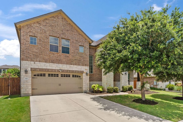 841 Expedition Way, Round Rock, TX 78665 - view of front of property with brick siding, stone siding, a garage, and driveway