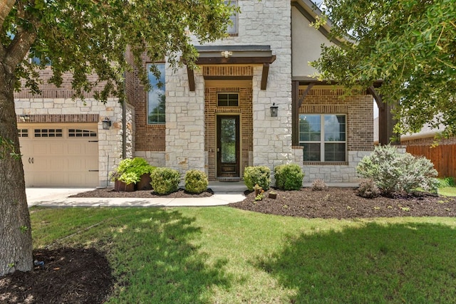 841 Expedition Way, Round Rock, TX 78665 - view of front of house with stone siding, a garage, and driveway