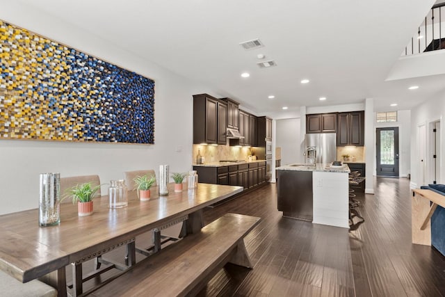 841 Expedition Way, Round Rock, TX 78665 - dining space with recessed lighting and dark wood-style flooring