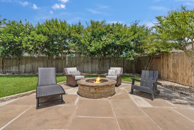 841 Expedition Way, Round Rock, TX 78665 - fenced backyard with an outdoor fire pit and a patio area