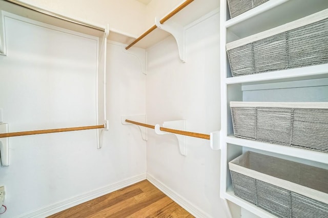 1213 Delsie Dr Unit A, Austin, TX 78734 - walk in closet with wood finished floors