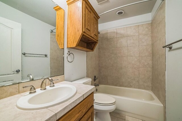 1213 Delsie Dr Unit A, Austin, TX 78734 - bathroom featuring vanity, washtub / shower combination, and tile patterned floors