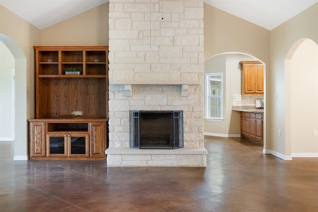 10565 N 77th Hwy, Lexington, TX 78947 - unfurnished living room with vaulted ceiling, finished concrete flooring, and a fireplace