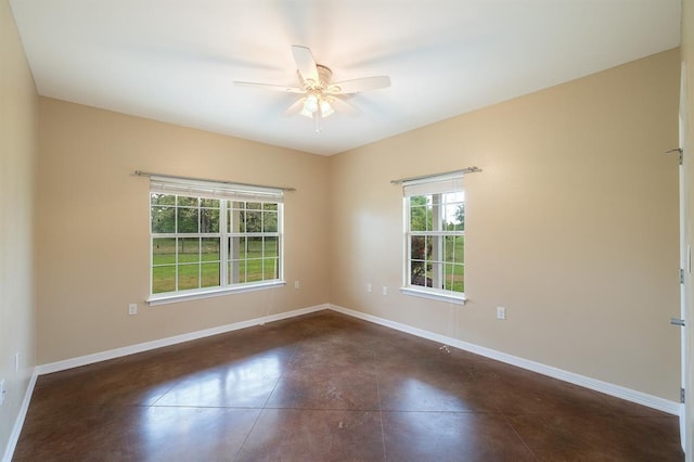 10565 N 77th Hwy, Lexington, TX 78947 - spare room featuring concrete flooring and ceiling fan