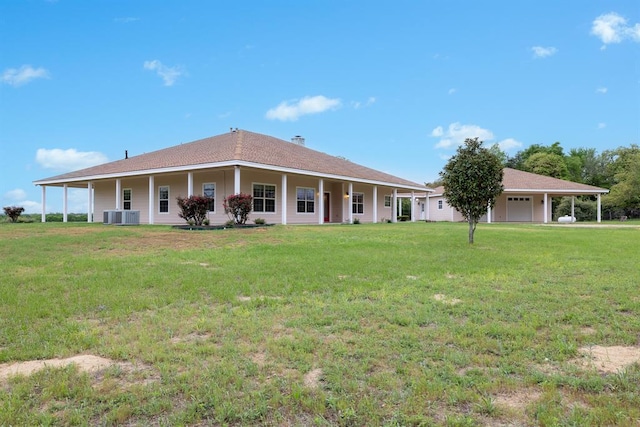 10565 N 77th Hwy, Lexington, TX 78947 - rear view of house with a yard and a chimney