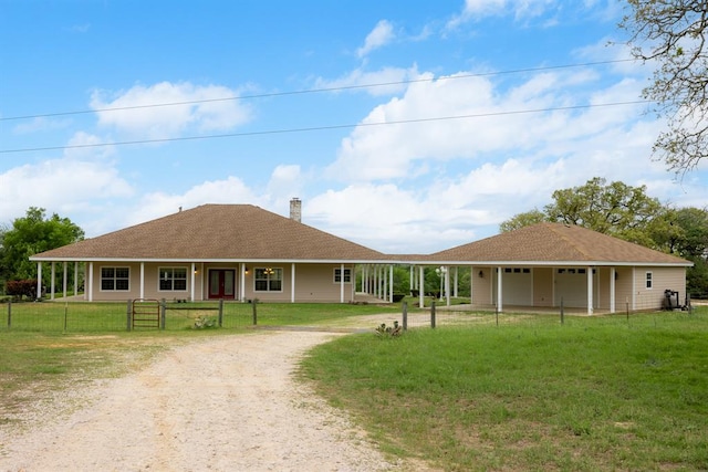 10565 N 77th Hwy, Lexington, TX 78947 - country-style home featuring dirt driveway, a chimney, and a garage