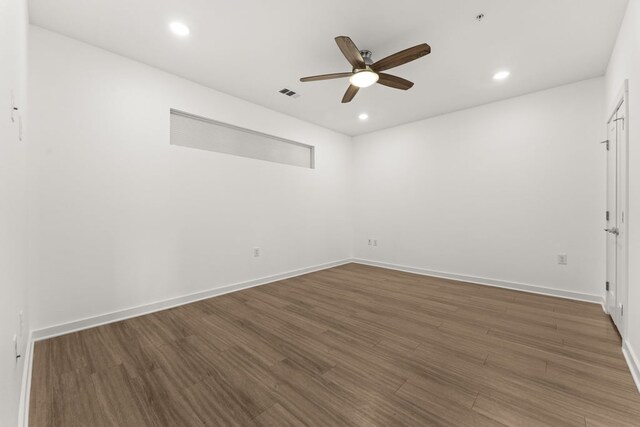 4361 S Congress Ave Unit 514, Austin, TX 78745 - spare room with a ceiling fan, wood finished floors, and recessed lighting