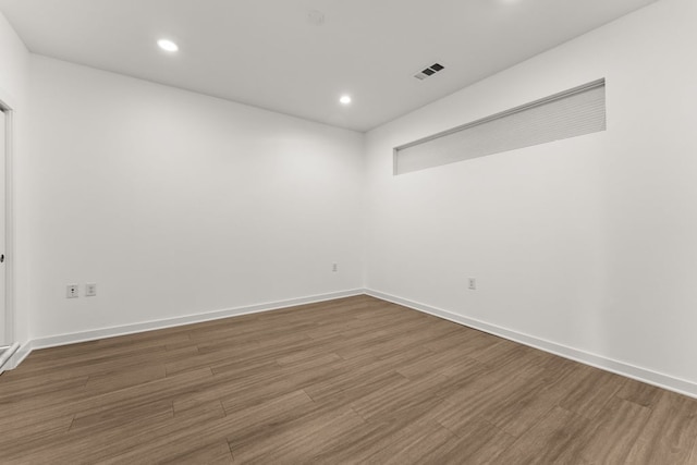 4361 S Congress Ave Unit 514, Austin, TX 78745 - spare room with recessed lighting and wood finished floors