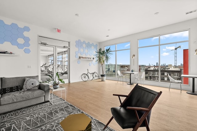 4361 S Congress Ave Unit 514, Austin, TX 78745 - living area with plenty of natural light and wood finished floors