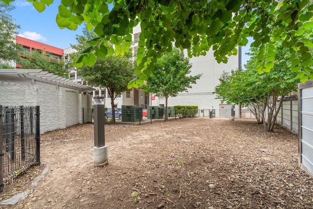 4361 S Congress Ave Unit 514, Austin, TX 78745 - view of yard featuring a pergola