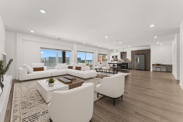 4361 S Congress Ave Unit 514, Austin, TX 78745 - living area with recessed lighting and wood finished floors
