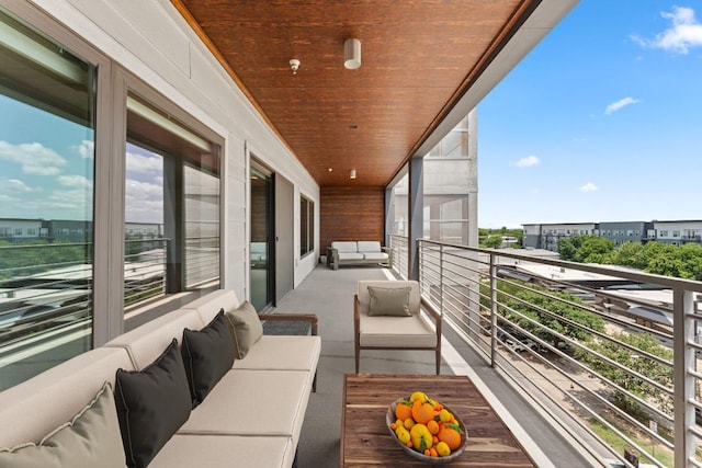 4361 S Congress Ave Unit 514, Austin, TX 78745 - balcony featuring an outdoor living space