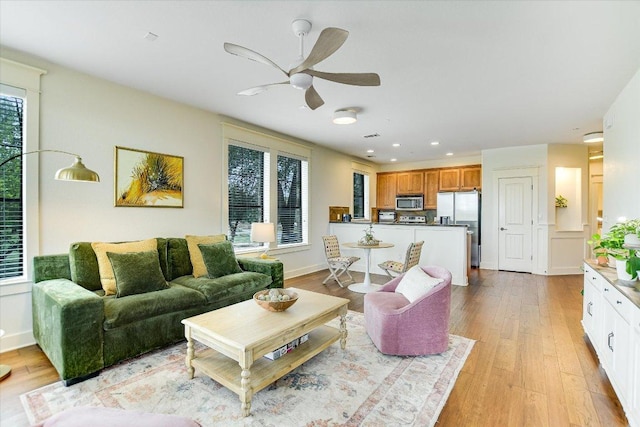 6608 Lantern View Dr Unit 102, Jonestown, TX 78645 - living room with a ceiling fan, light wood finished floors, plenty of natural light, and recessed lighting