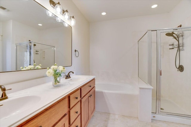 6608 Lantern View Dr Unit 102, Jonestown, TX 78645 - bathroom featuring a stall shower, a garden tub, double vanity, and recessed lighting