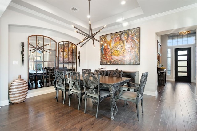 131 Katie Dr, Austin, TX 78737 - dining area with a chandelier, wood finished floors, a tray ceiling, recessed lighting, and ornamental molding